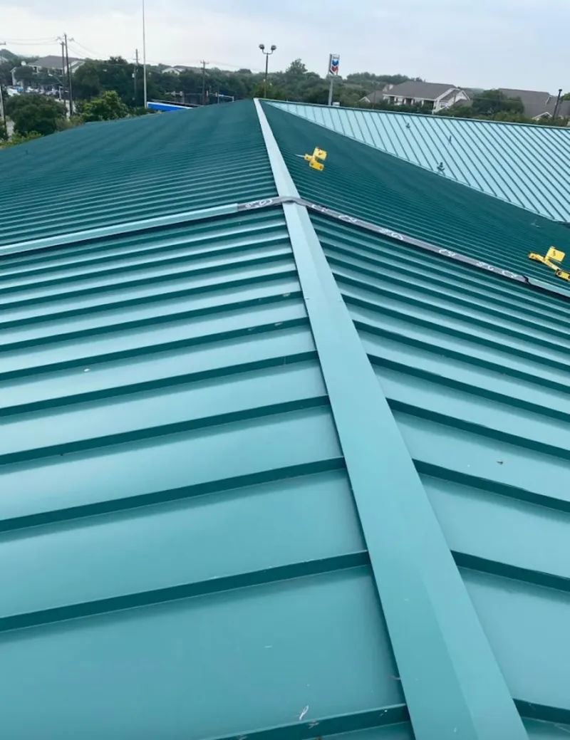 Green commercial metal roof ridge and valley for Metal Roof Repair in Somersworth