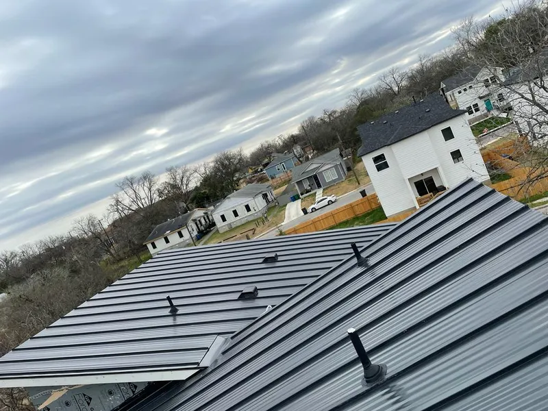 Standing seam metal roof panels with vents for Skylight Repair in Somersworth